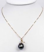 Tahitská perla s briliantem v 18ti karátovém zlatě s briliantem