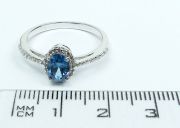 Stříbrný prsten s topazem a zirkony velikost 57